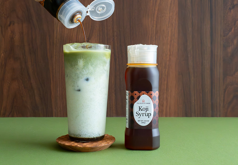 Matcha with bottle of Koji Syrup